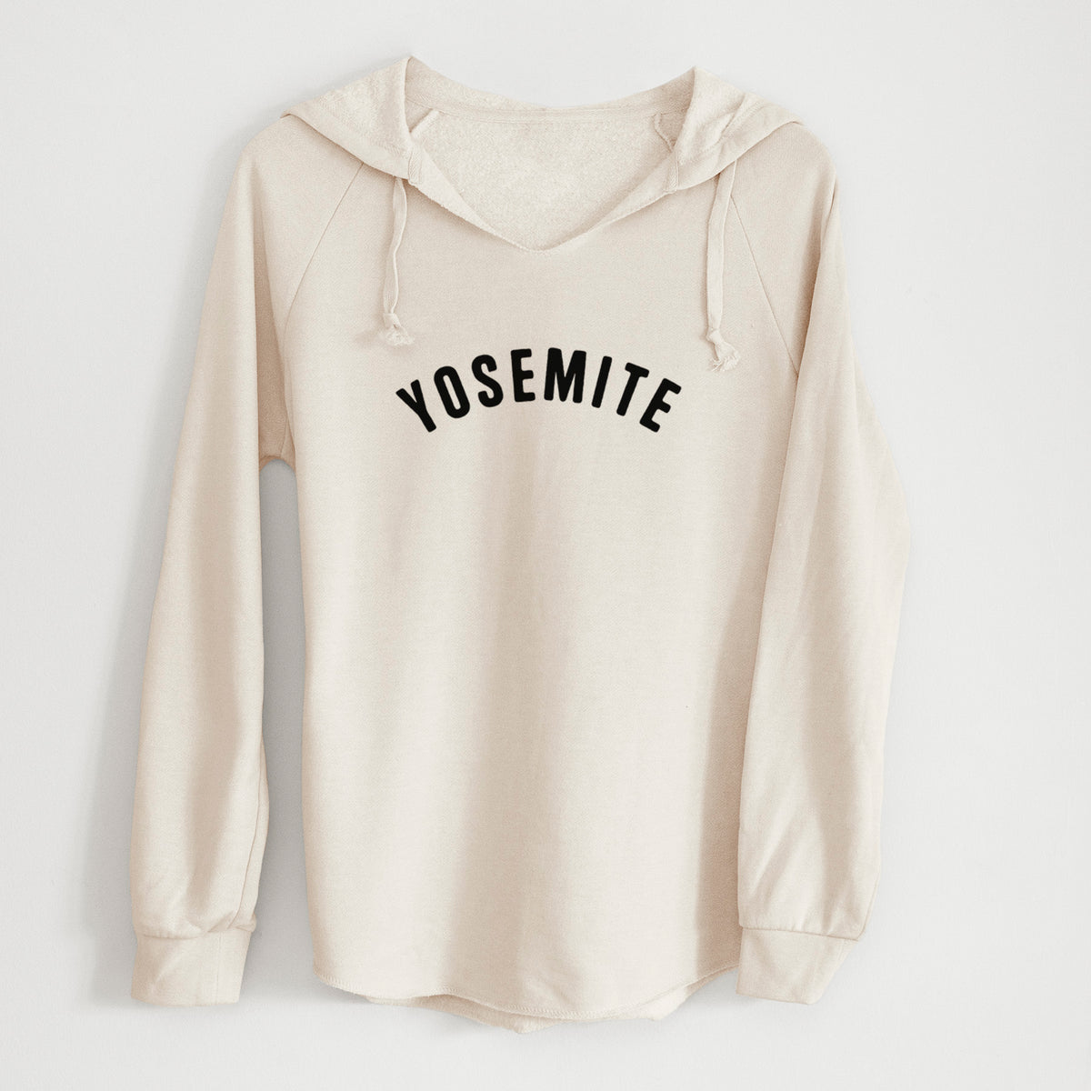Bone cream women's Cali Wave hooded sweatshirt laid flat, printed with the word Yosemite in bold black letters arched across the chest.