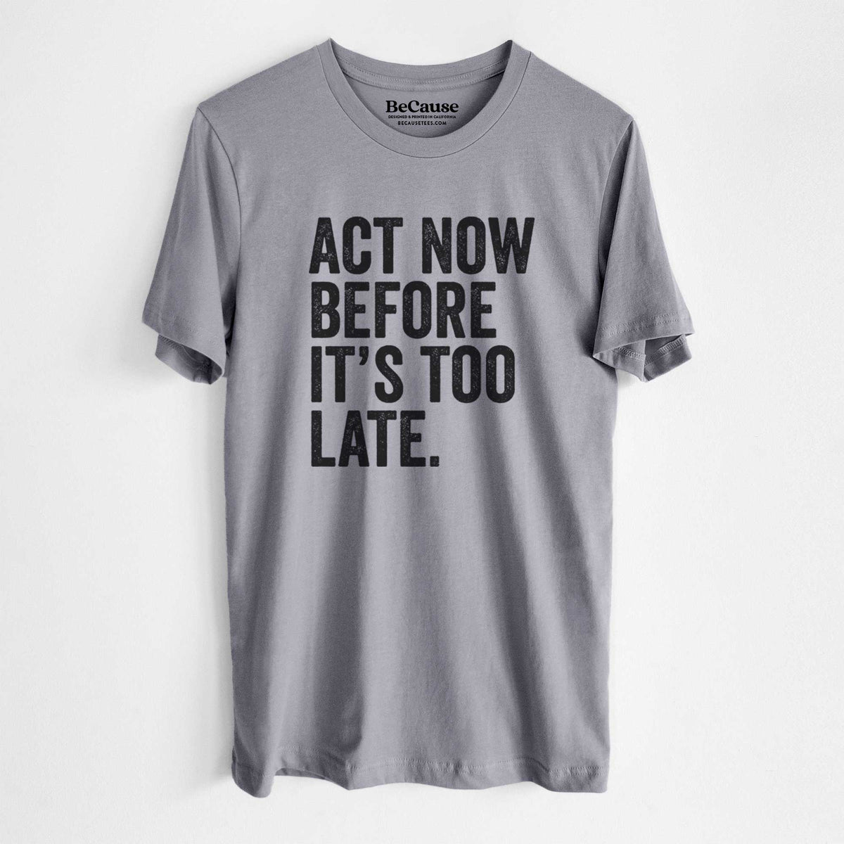 Storm grey lightweight cotton t-shirt laid flat, printed with bold black words reading Act Now Before It's Too Late.