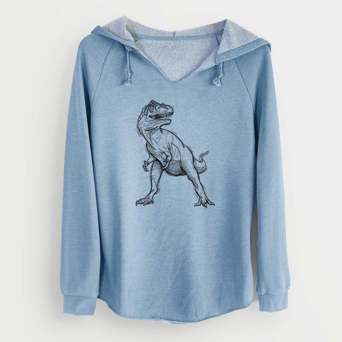 Misty blue women's Cali Wave hooded sweatshirt laid flat, printed with a black ink illustration of an Allosaurus walking.