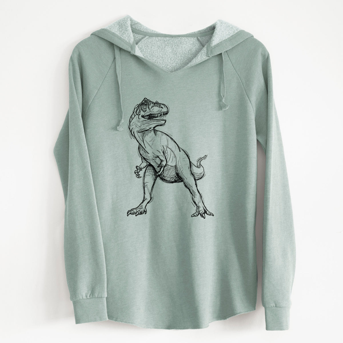 Sage green women's Cali Wave hooded sweatshirt laid flat, printed with a black ink illustration of an Allosaurus walking.