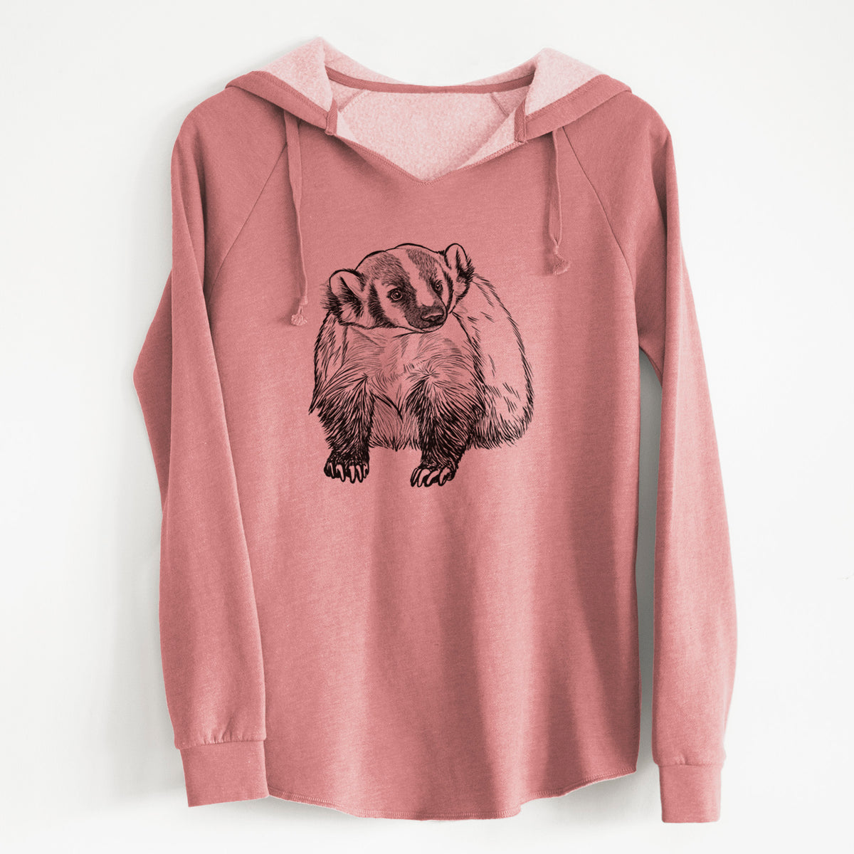 Dusty rose women's Cali Wave hooded sweatshirt laid flat, printed with a detailed black ink illustration of an American badger facing forward.