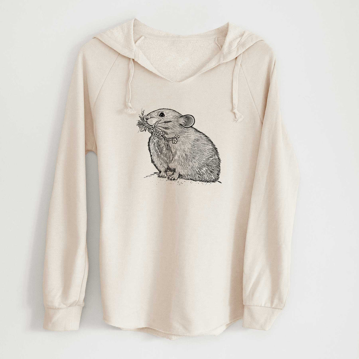 Bone cream women's Cali Wave hooded sweatshirt laid flat, printed with a detailed black ink illustration of an American pika holding flowers and grass in its mouth.