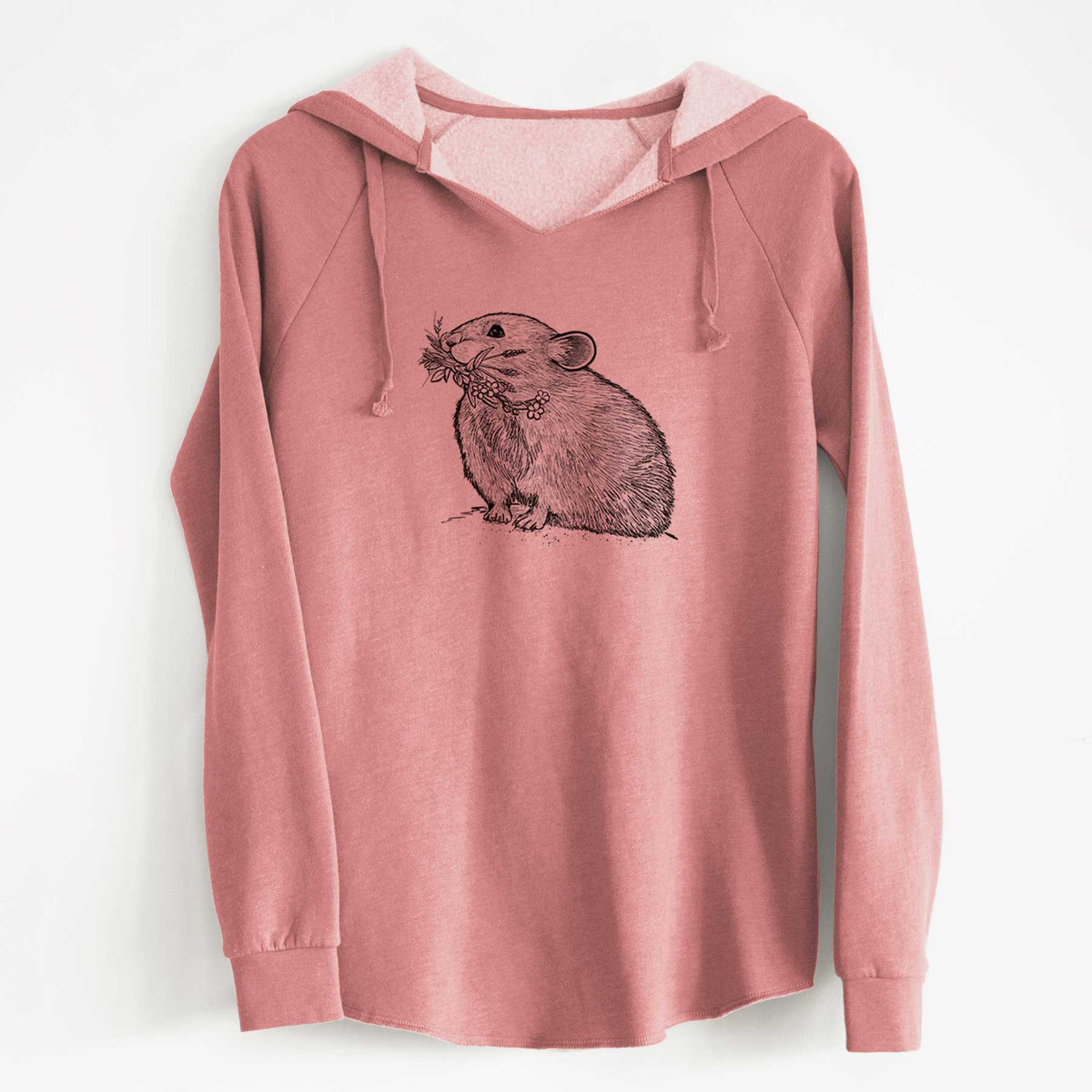 Dusty rose women's Cali Wave hooded sweatshirt laid flat, printed with a detailed black ink illustration of an American pika holding flowers and grass in its mouth.