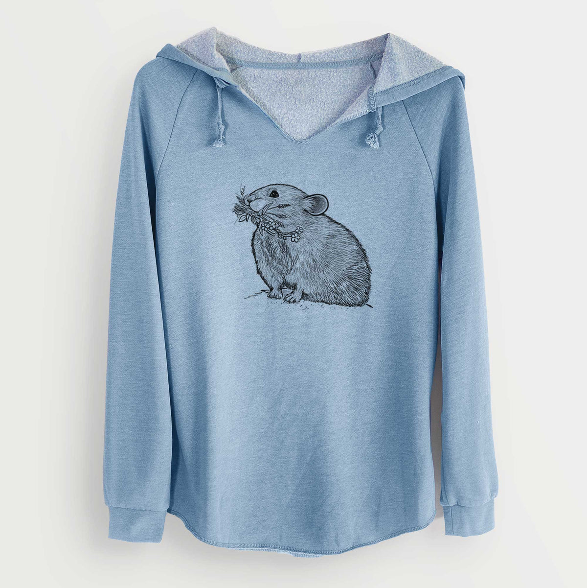 Misty blue women's Cali Wave hooded sweatshirt laid flat, printed with a detailed black ink illustration of an American pika holding flowers and grass in its mouth.