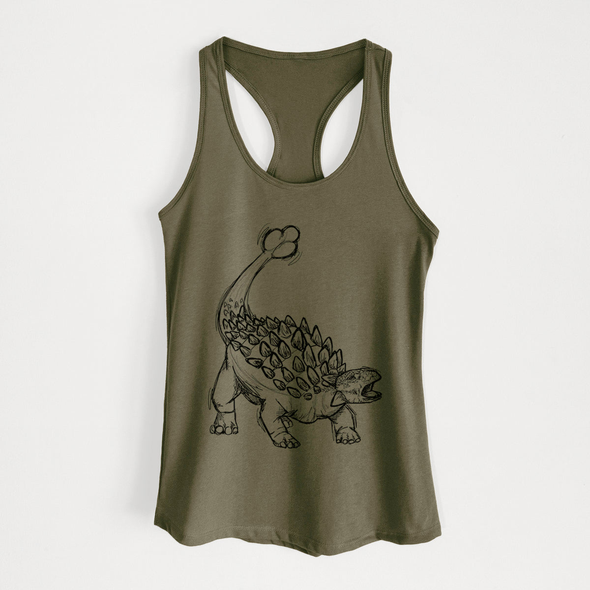 Military green women's racerback tank top laid flat, printed with a black ink illustration of an Ankylosaurus with its club tail raised.