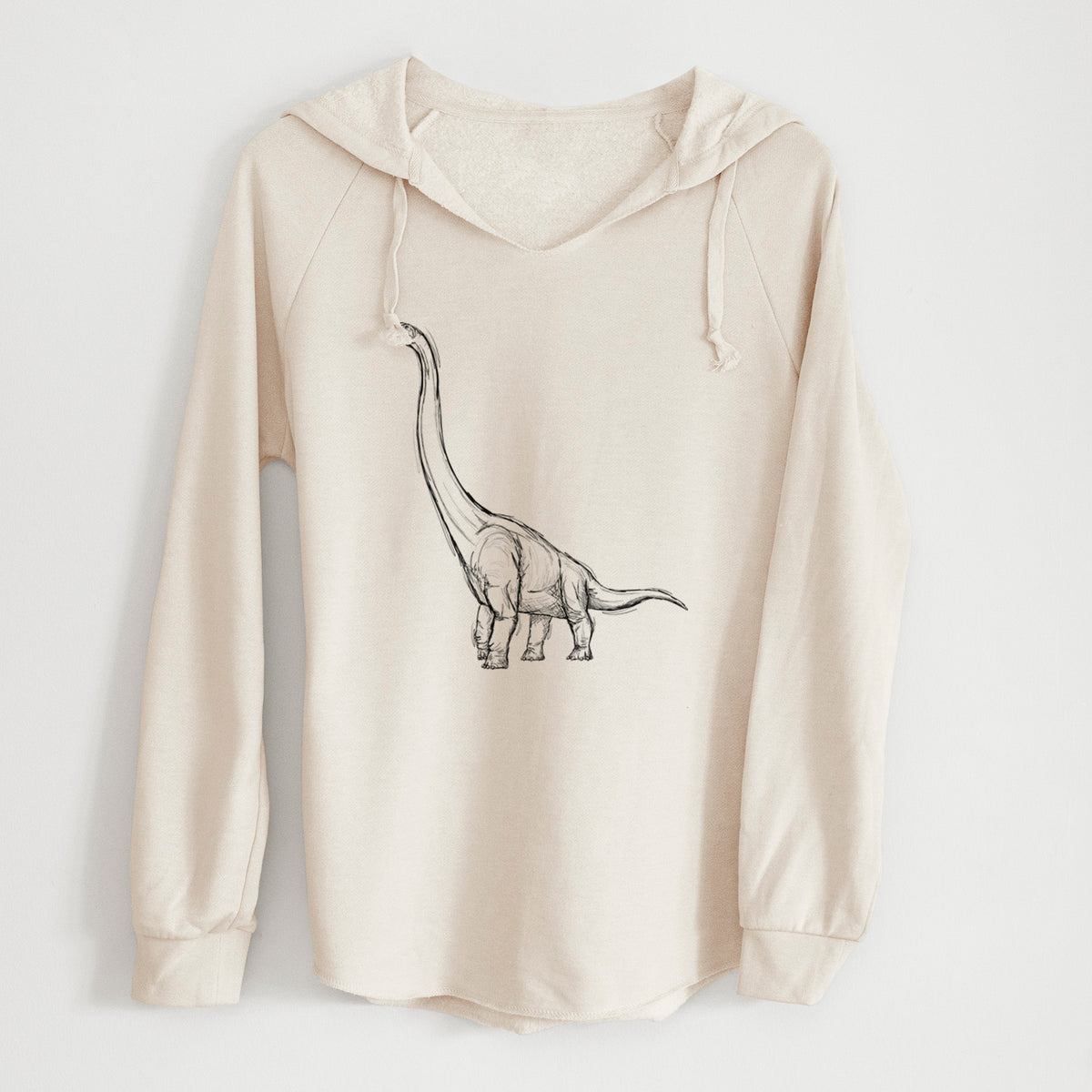Bone cream women's Cali Wave hooded sweatshirt laid flat, printed with a black ink illustration of a long-necked Apatosaurus walking.