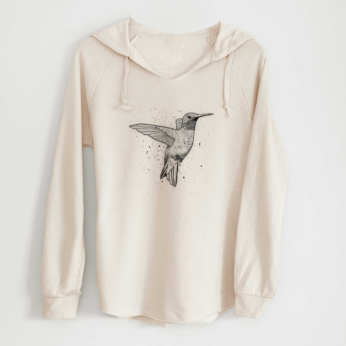 Bone cream women's Cali Wave hooded sweatshirt laid flat, printed with a black ink sketch of a ruby-throated hummingbird hovering with its wings raised.