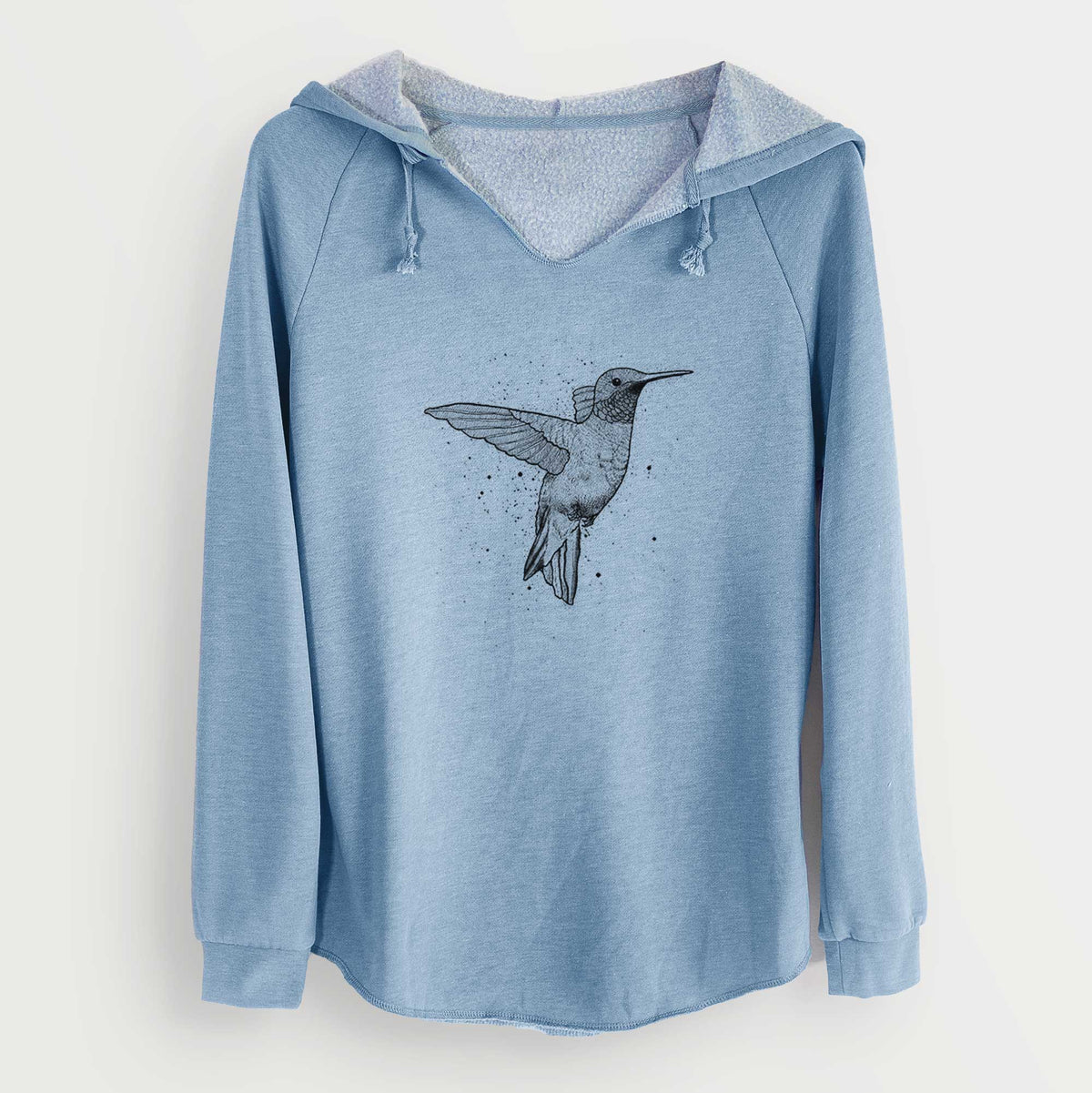 Misty blue women's Cali Wave hooded sweatshirt laid flat, printed with a black ink sketch of a ruby-throated hummingbird hovering with its wings raised.