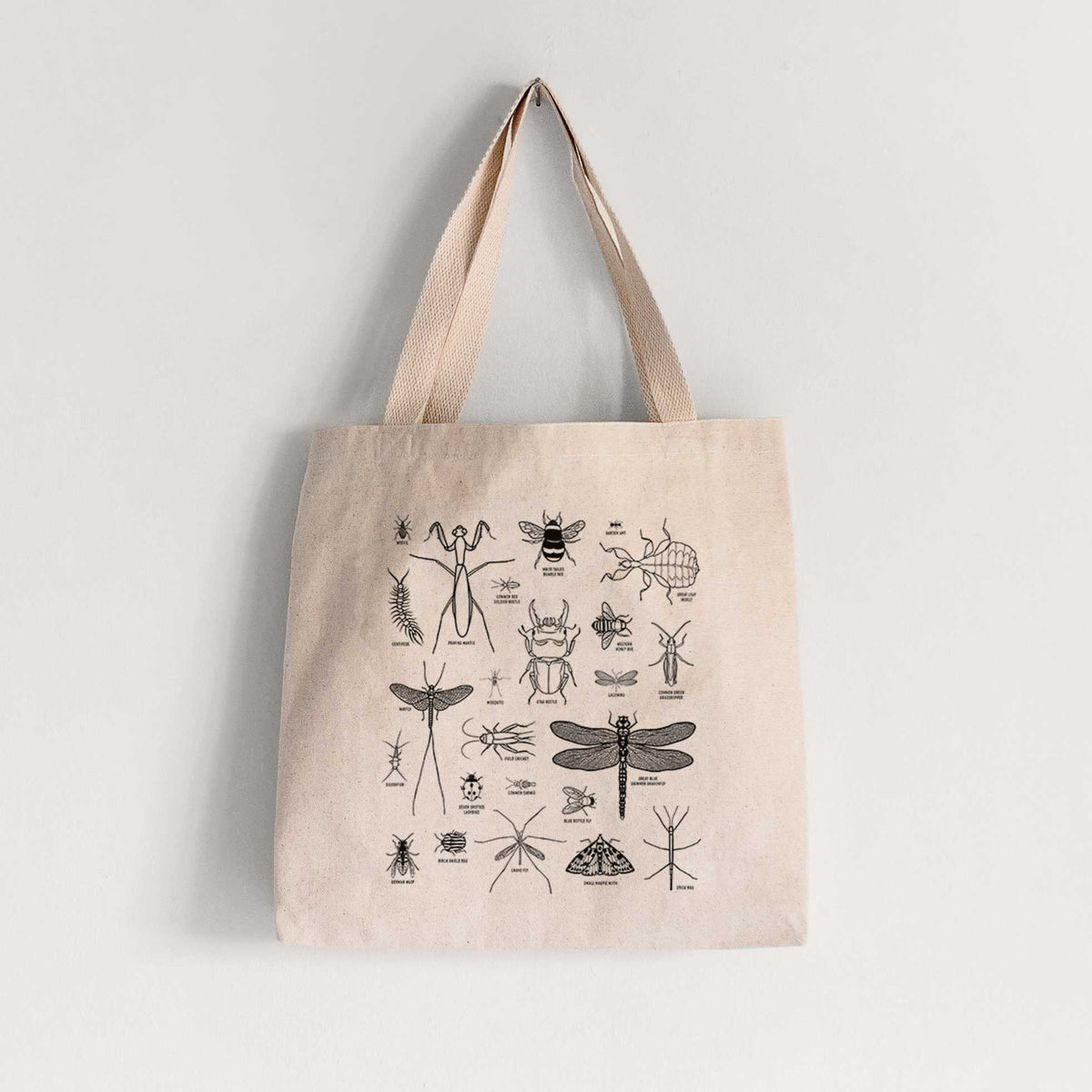 Natural canvas tote bag printed with a chart of black ink insect and arthropod illustrations, including dragonflies, beetles, spiders and bees.