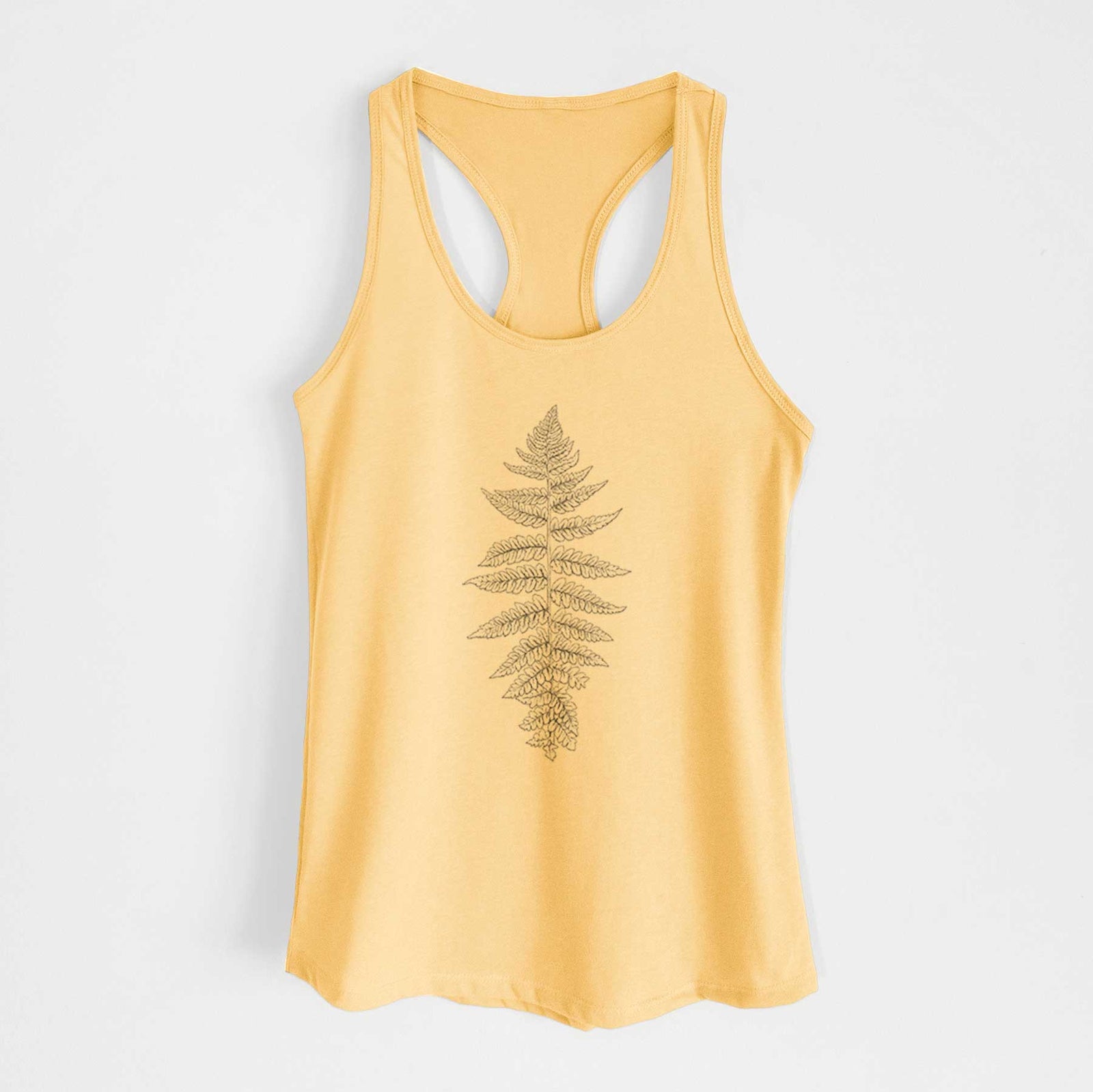 Banana cream women's racerback tank top laid flat, printed with a black ink illustration of a lady fern frond.