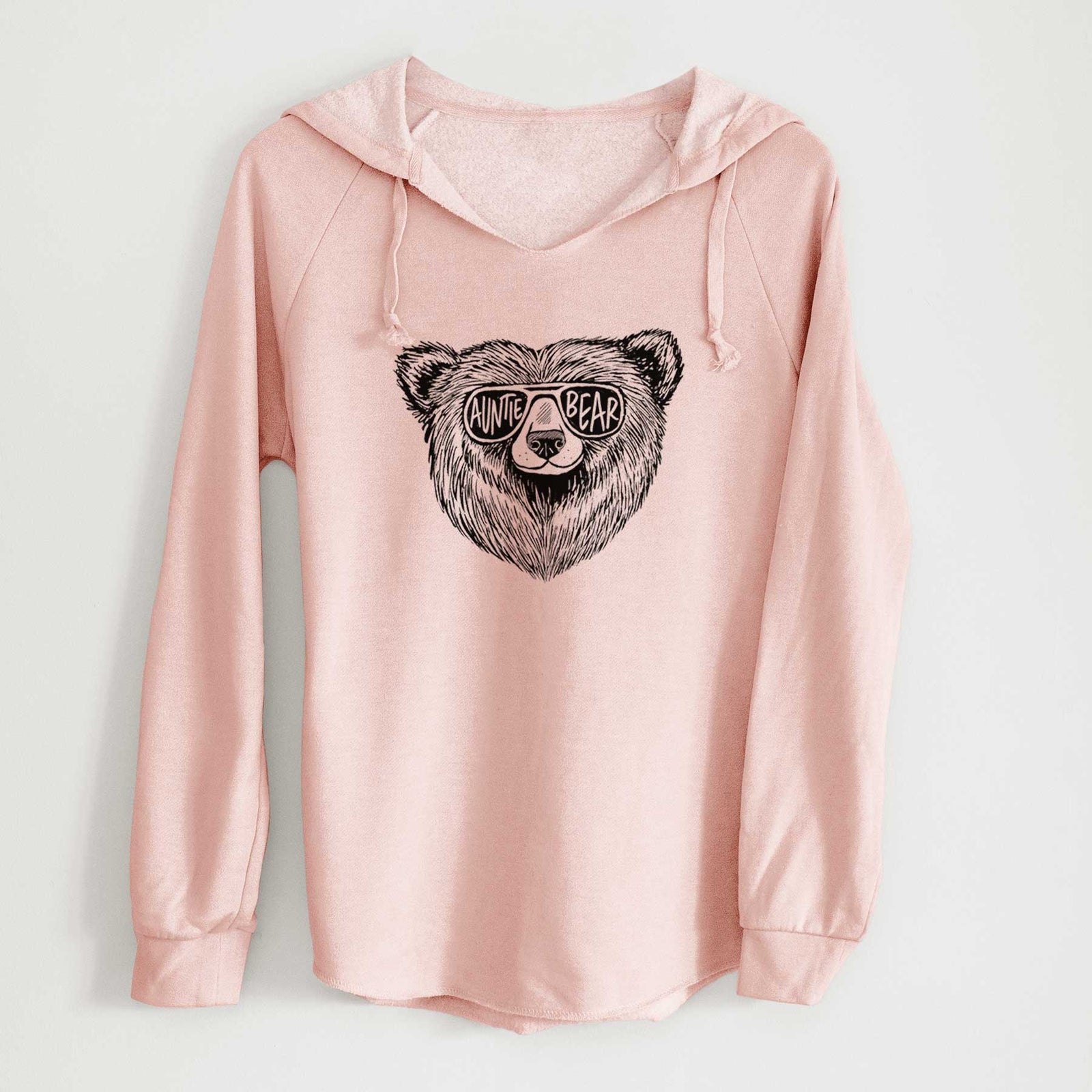 Sage green women's Cali Wave hooded sweatshirt laid flat, printed with a black ink bear's face wearing sunglasses that read Auntie Bear.