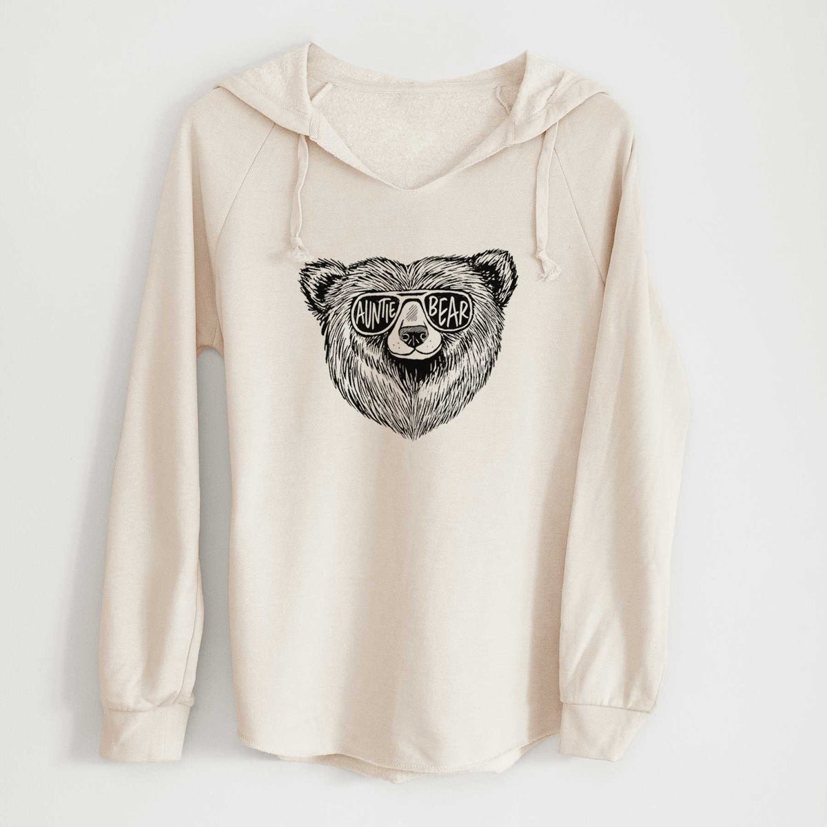 Bone cream women's Cali Wave hooded sweatshirt laid flat, printed with a black ink bear's face wearing sunglasses that read Auntie Bear.