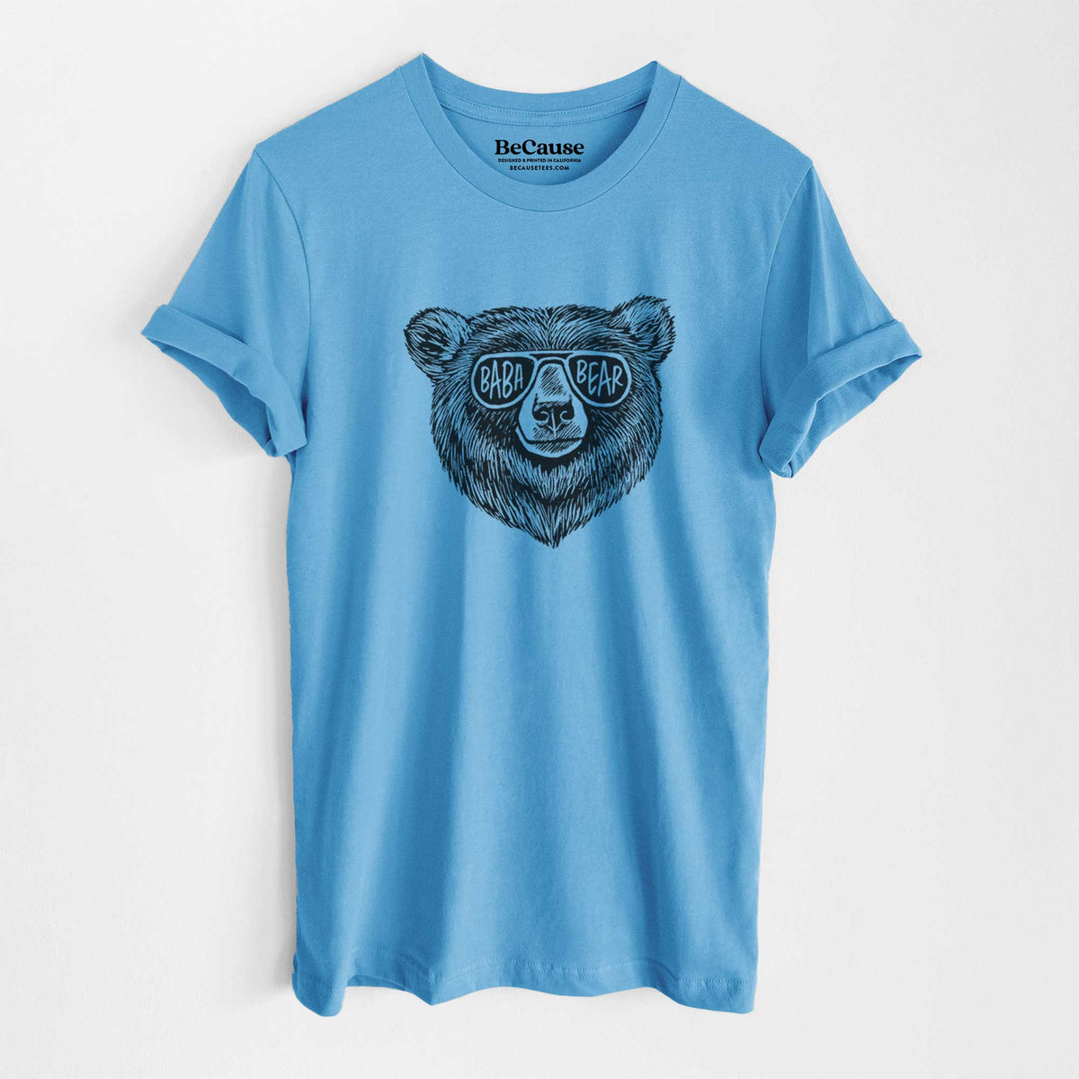 Ocean blue lightweight cotton t-shirt laid flat, printed with a black ink bear's face wearing sunglasses that read Baba Bear.