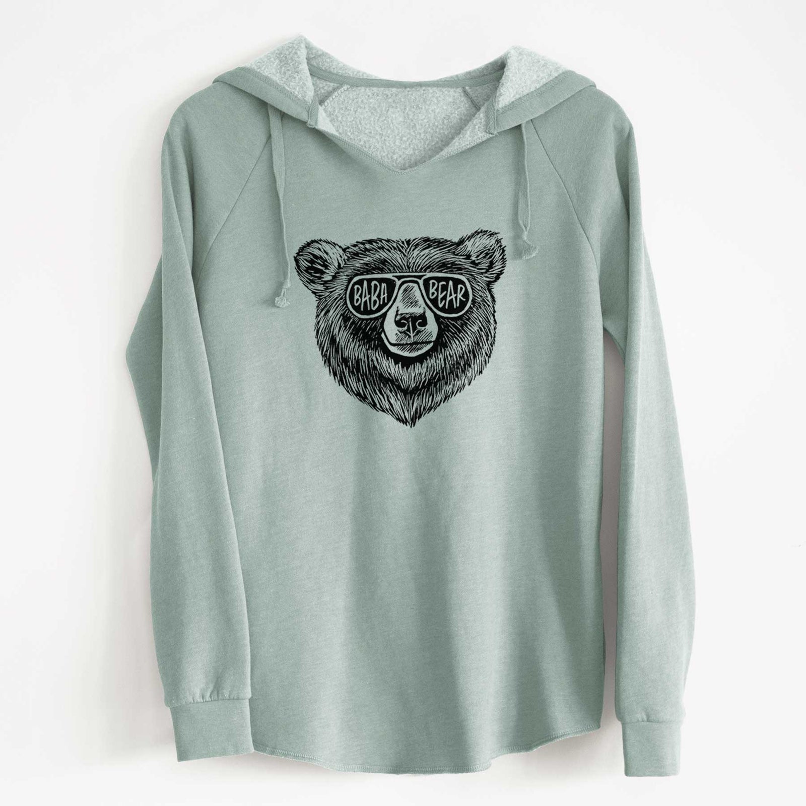 Sage green women's Cali Wave hooded sweatshirt laid flat, printed with a black ink bear's face wearing sunglasses that read Baba Bear.