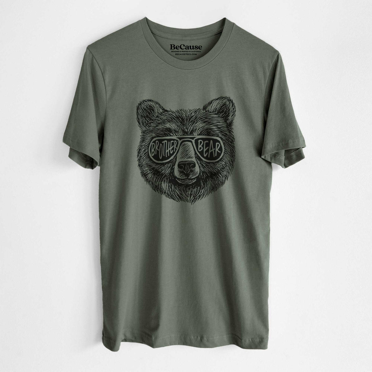 Military green lightweight cotton t-shirt laid flat, printed with a black ink bear's face wearing sunglasses that read Brother Bear.