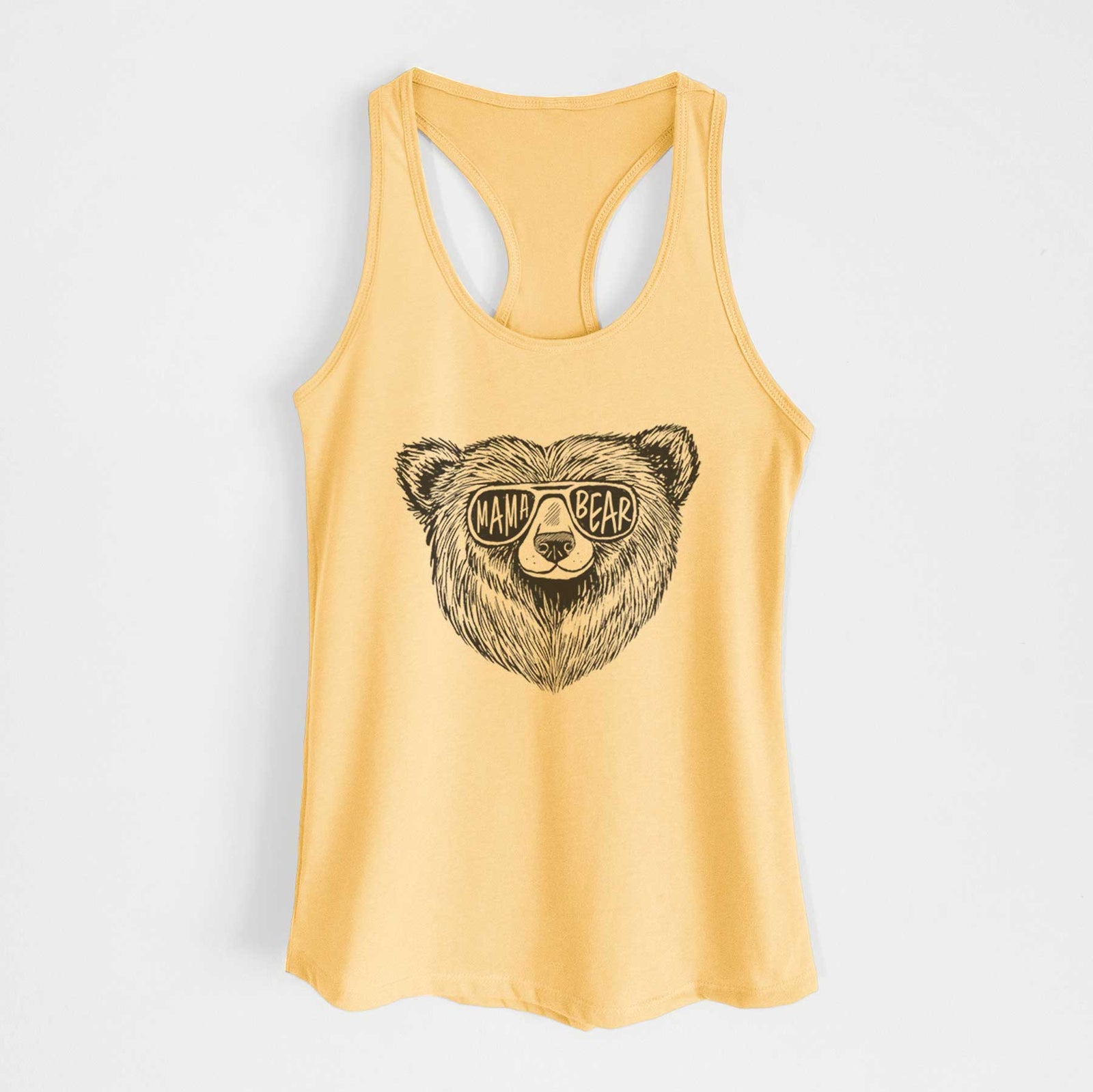 Banana cream women's racerback tank top laid flat, printed with a black ink bear's face wearing sunglasses that read Mama Bear.