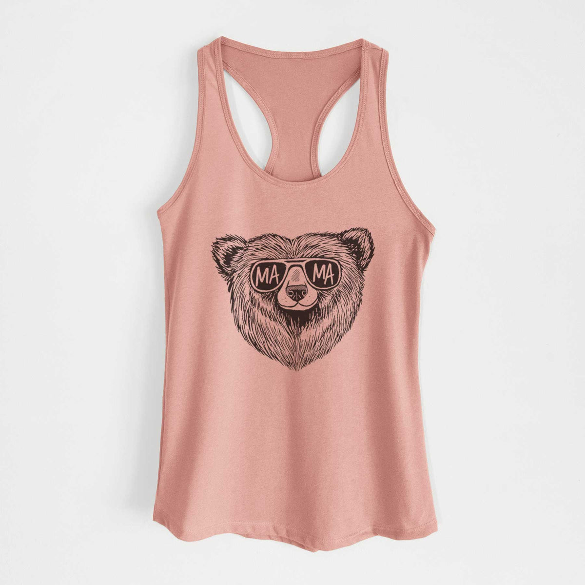 Desert pink women's racerback tank top laid flat, printed with a black ink bear's face wearing sunglasses that read Mama.