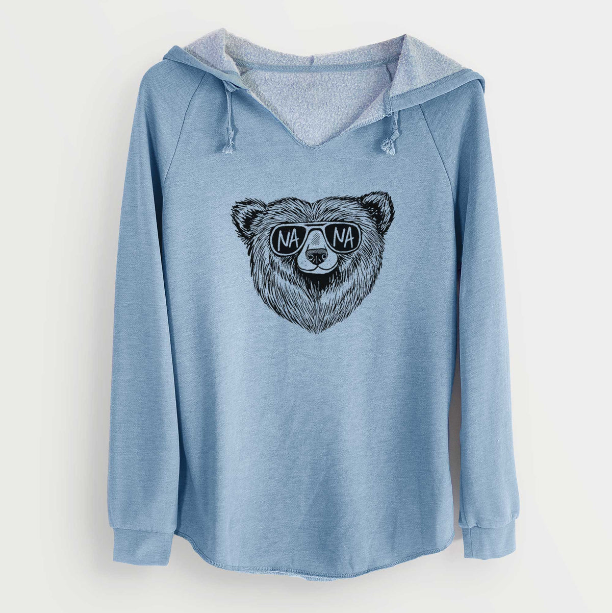 Misty blue women's Cali Wave hooded sweatshirt laid flat, printed with a black ink bear's face wearing sunglasses that read Nana.