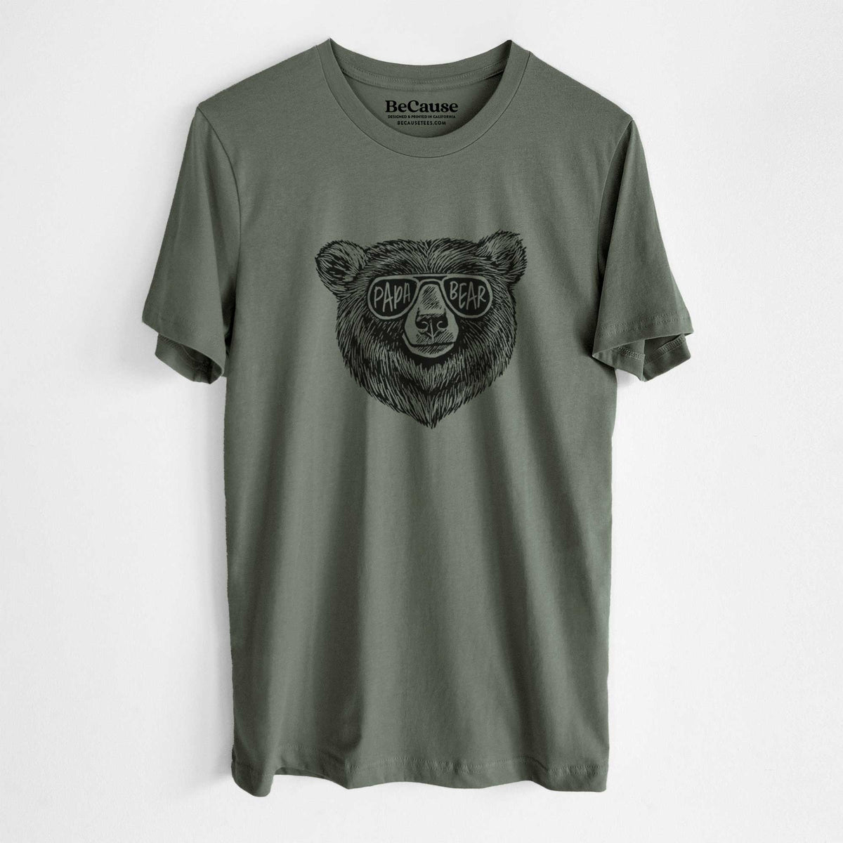 Military green lightweight cotton t-shirt laid flat, printed with a black ink bear's face wearing sunglasses that read Papa Bear.