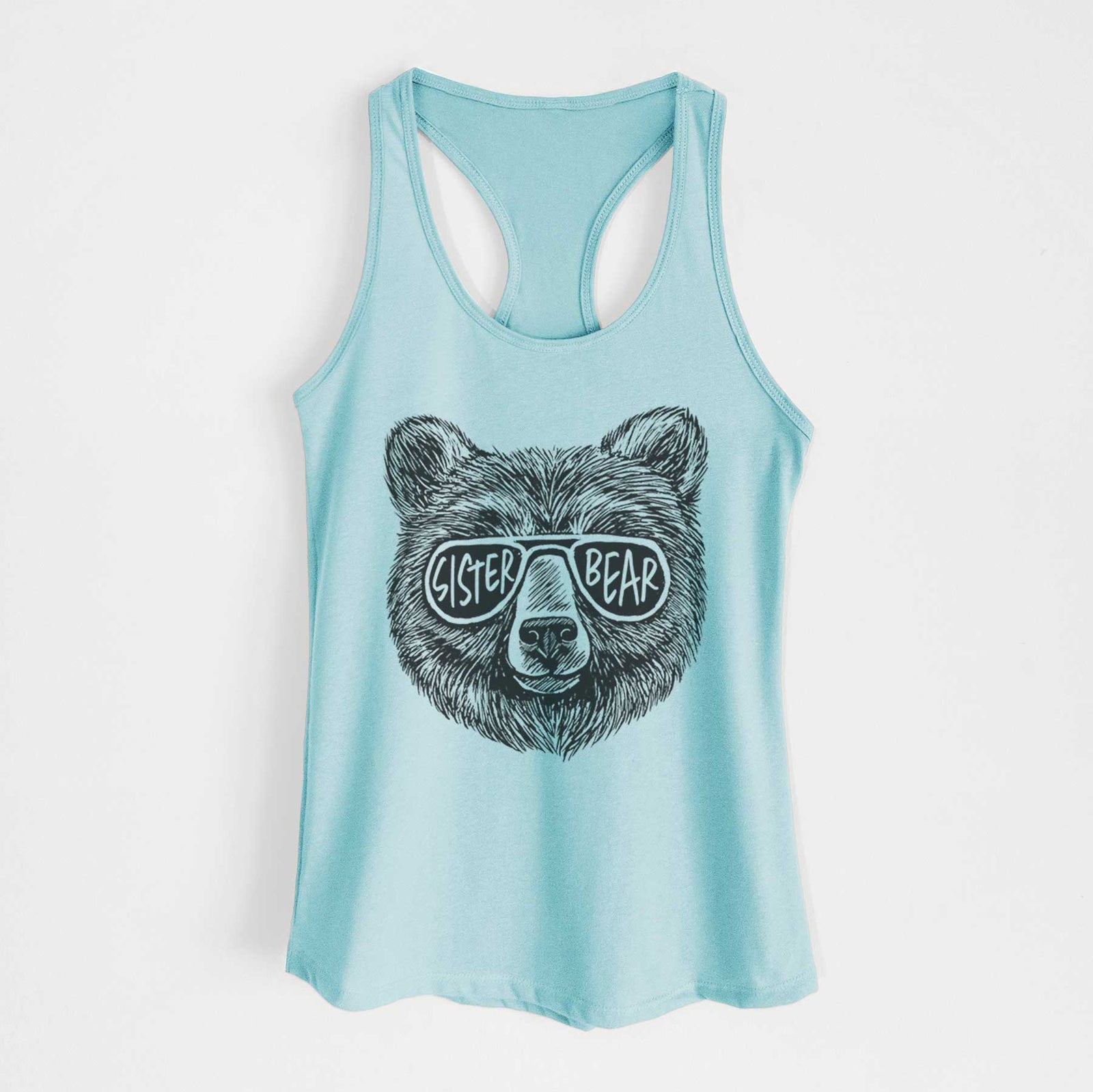 Banana cream women's racerback tank top laid flat, printed with a black ink bear's face wearing sunglasses that read Sister Bear.