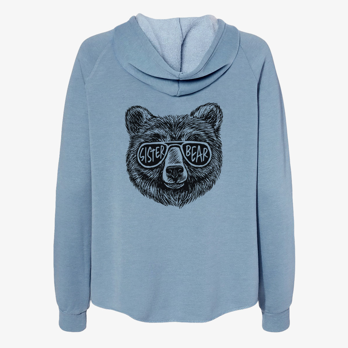 Misty blue women's Cali Wave zip-up sweatshirt laid flat, printed with a black ink bear's face wearing sunglasses that read Sister Bear.