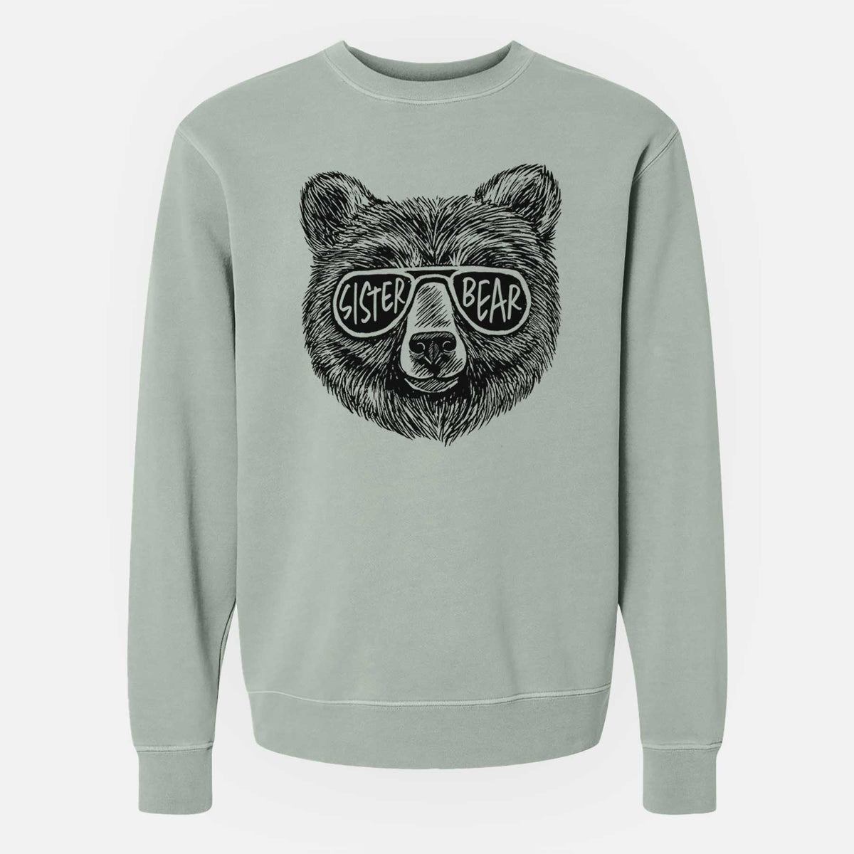 Sage green pigment dyed crewneck sweatshirt laid flat, printed with a black ink bear's face wearing sunglasses that read Sister Bear.