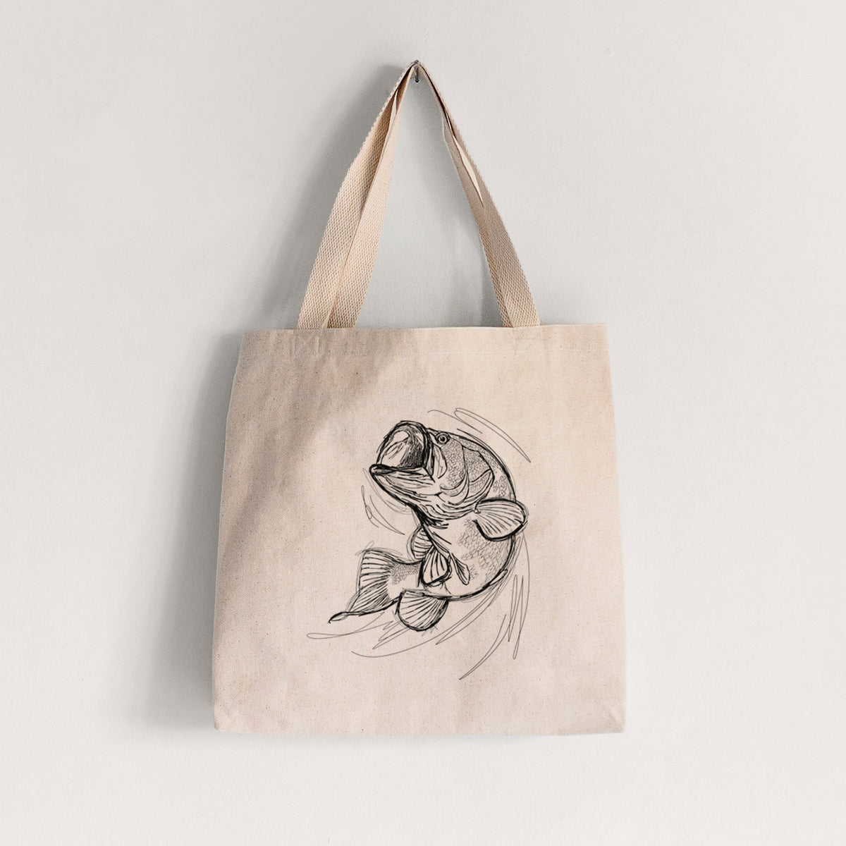 Natural canvas tote bag printed with a detailed black ink illustration of a largemouth bass leaping with its mouth open.