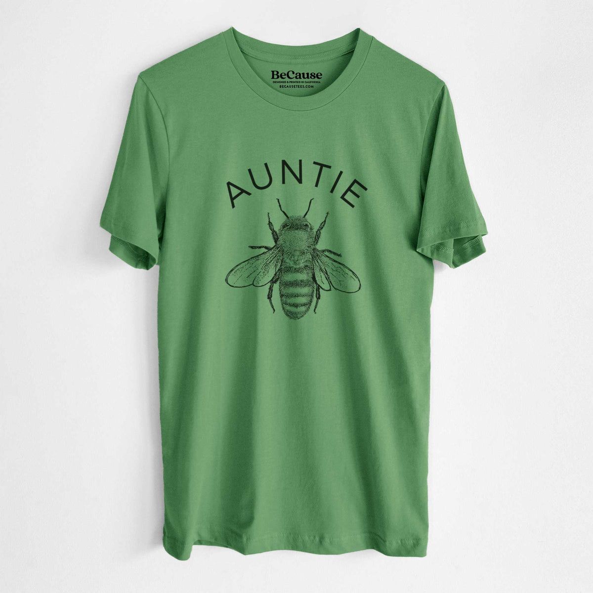Leaf green lightweight cotton t-shirt laid flat, printed with a black ink honey bee beneath the word Auntie.