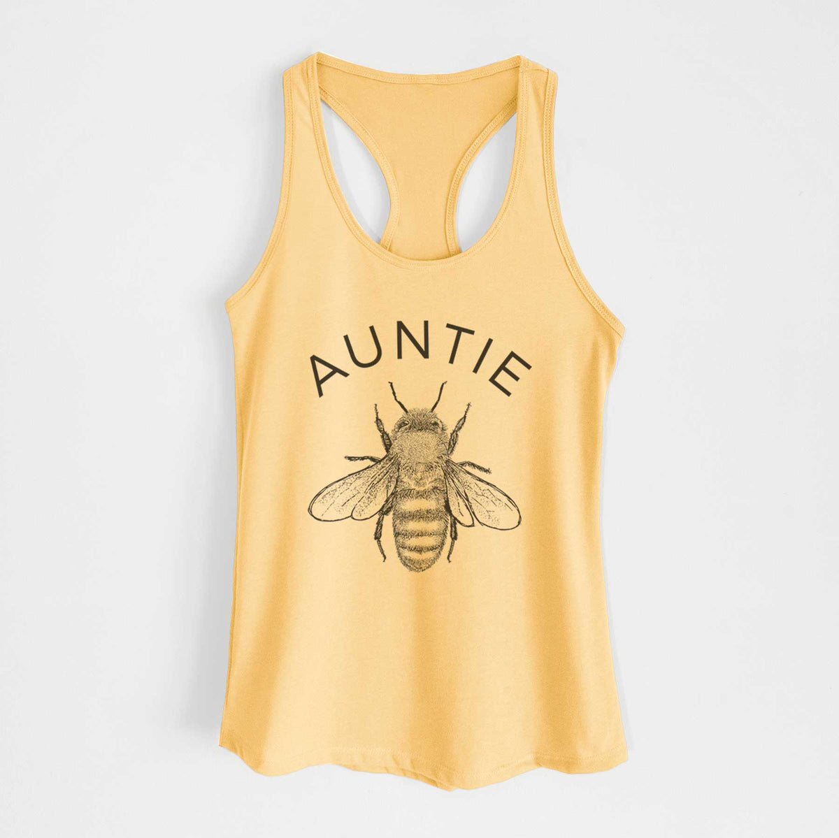 Banana cream women's racerback tank top laid flat, printed with a black ink honey bee beneath the word Auntie.