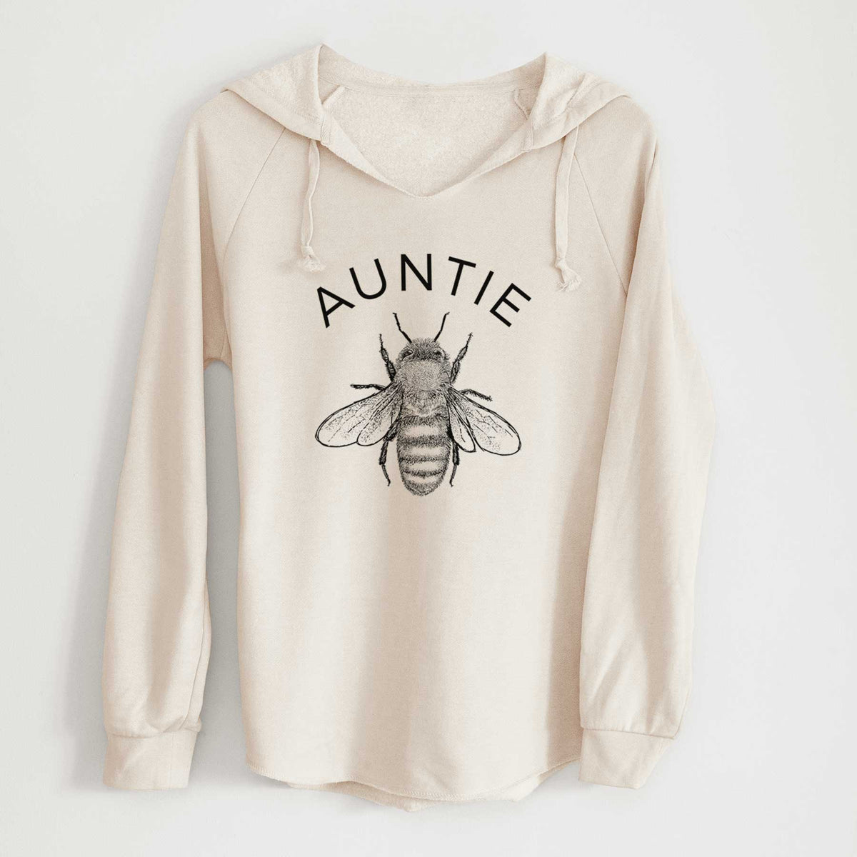 Bone cream women's Cali Wave hooded sweatshirt laid flat, printed with a black ink honey bee beneath the word Auntie.