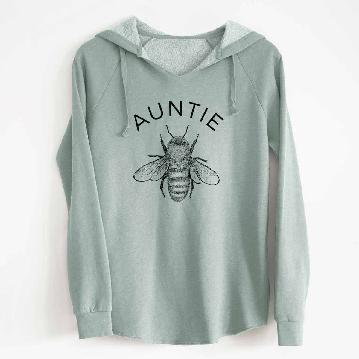 Sage green women's Cali Wave hooded sweatshirt laid flat, printed with a black ink honey bee beneath the word Auntie.