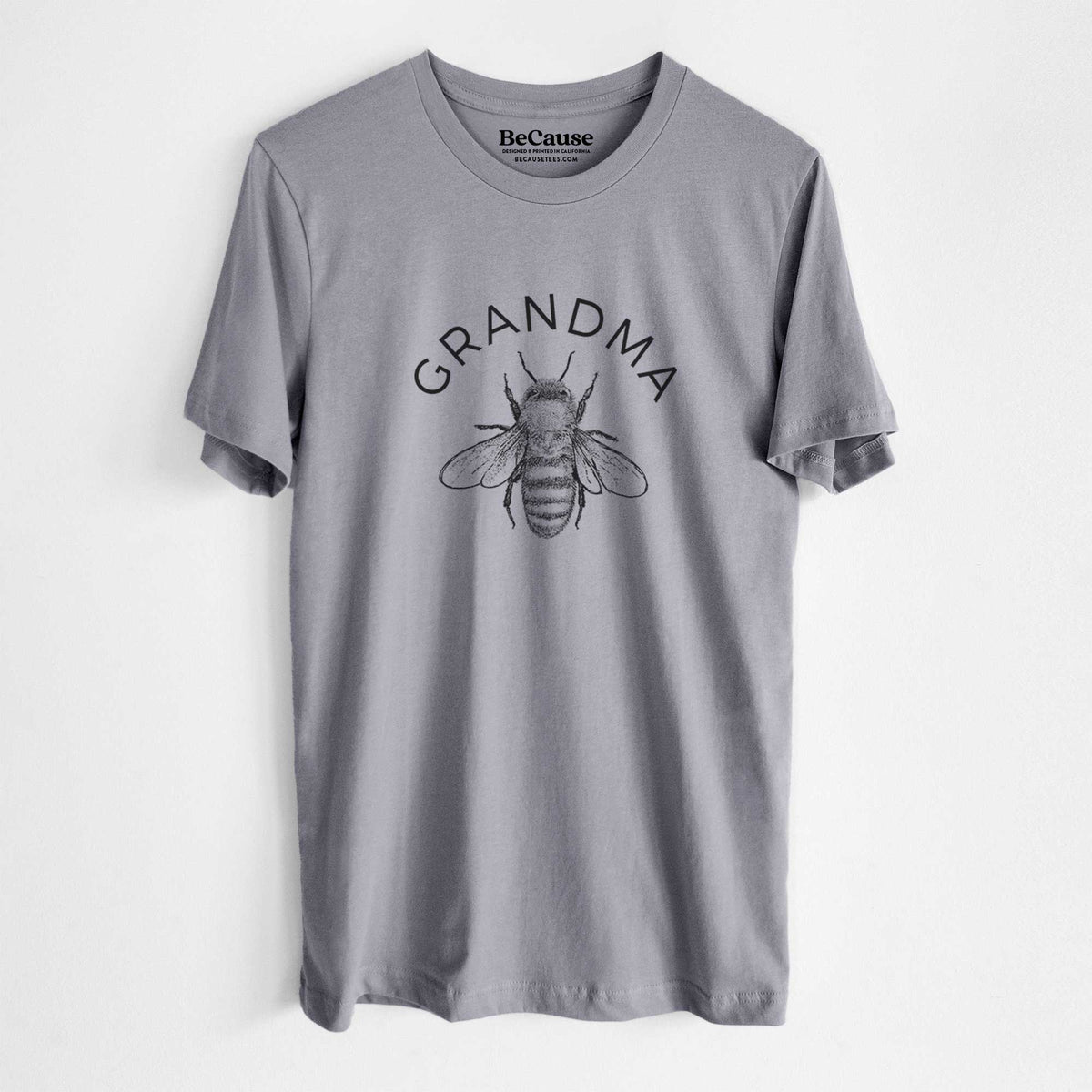 Storm grey lightweight cotton t-shirt laid flat, printed with a black ink honey bee beneath the word Grandma.