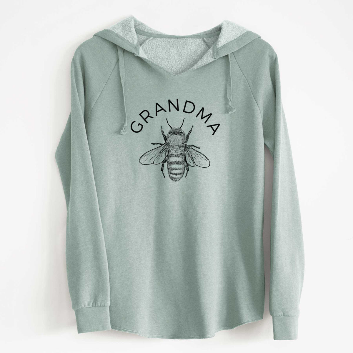 Sage green women's Cali Wave hooded sweatshirt laid flat, printed with a black ink honey bee beneath the word Grandma.