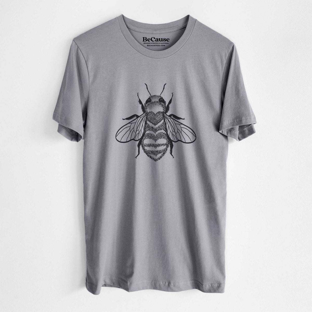 Storm grey lightweight cotton t-shirt laid flat, printed with a black ink bee with a heart pattern on its body.