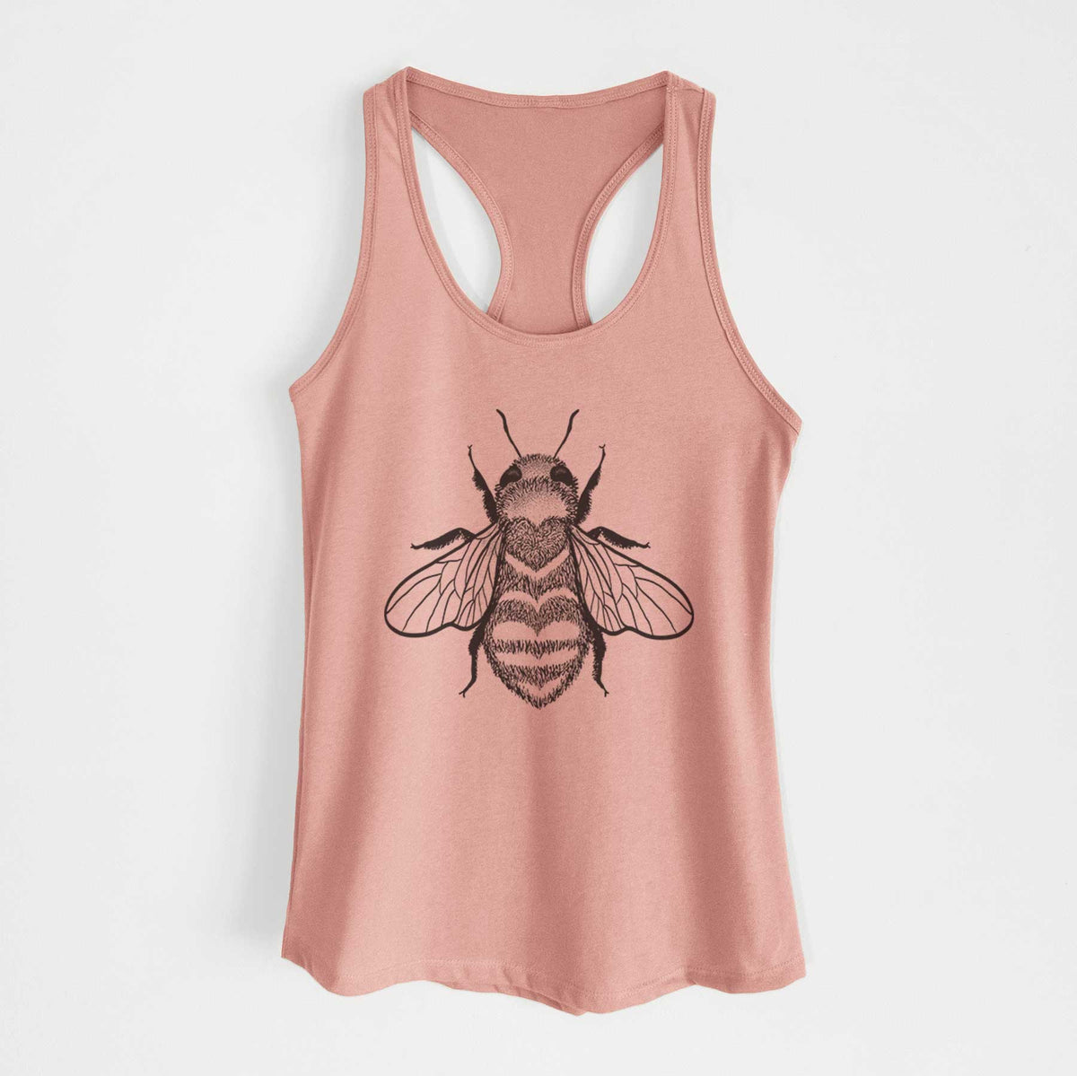 Desert pink women's racerback tank top laid flat, printed with a black ink bee with a heart pattern on its body.