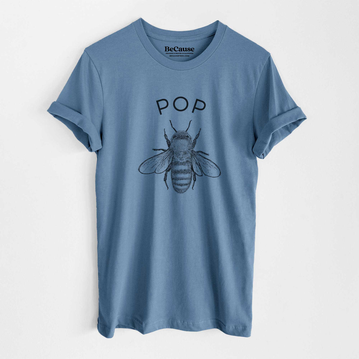 Steel blue lightweight cotton t-shirt laid flat, printed with a black ink honey bee beneath the word Pop.