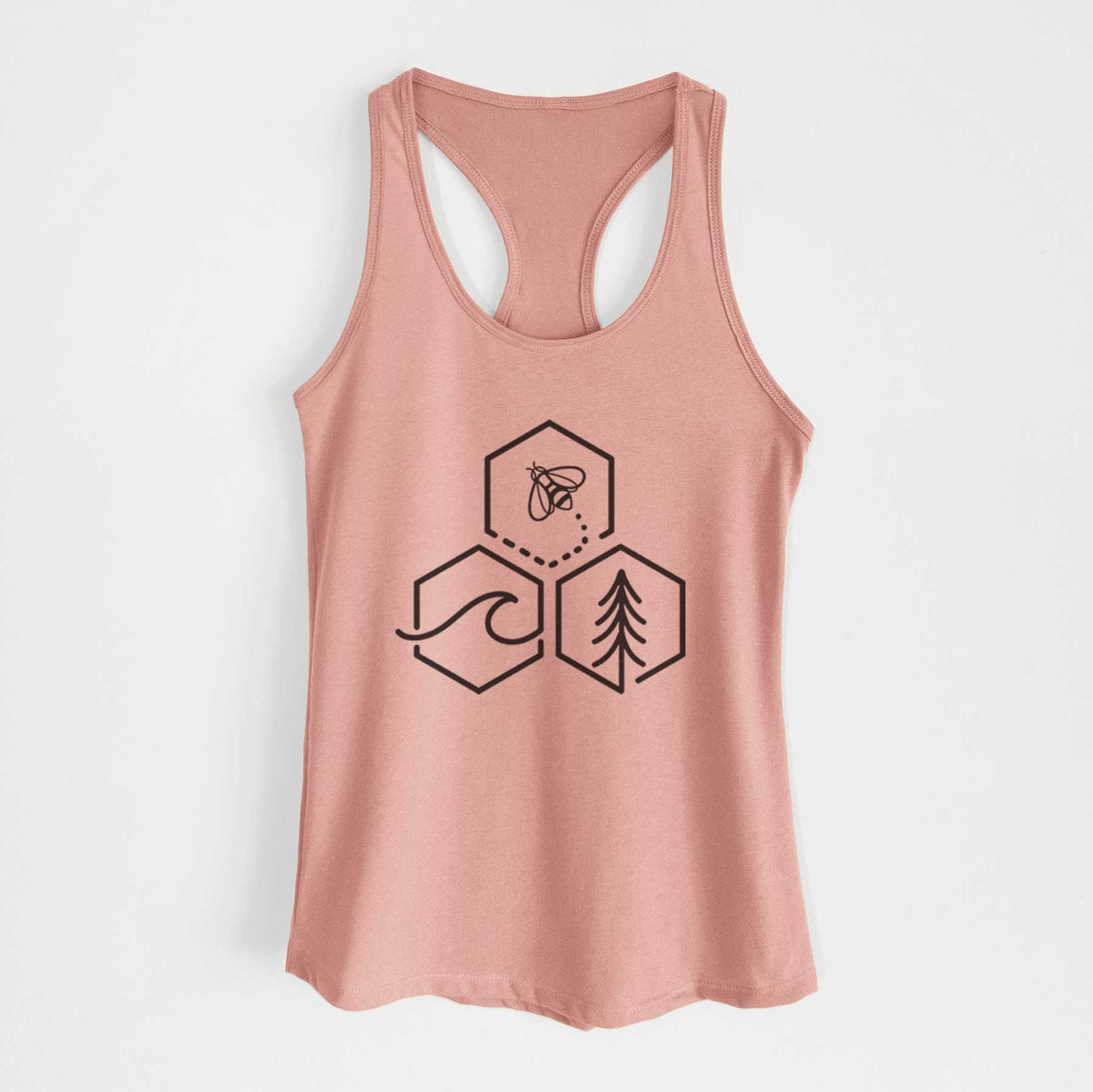 Desert pink women's racerback tank top laid flat, printed with a black line art design of three hexagons holding a bee, an ocean wave and a pine tree.