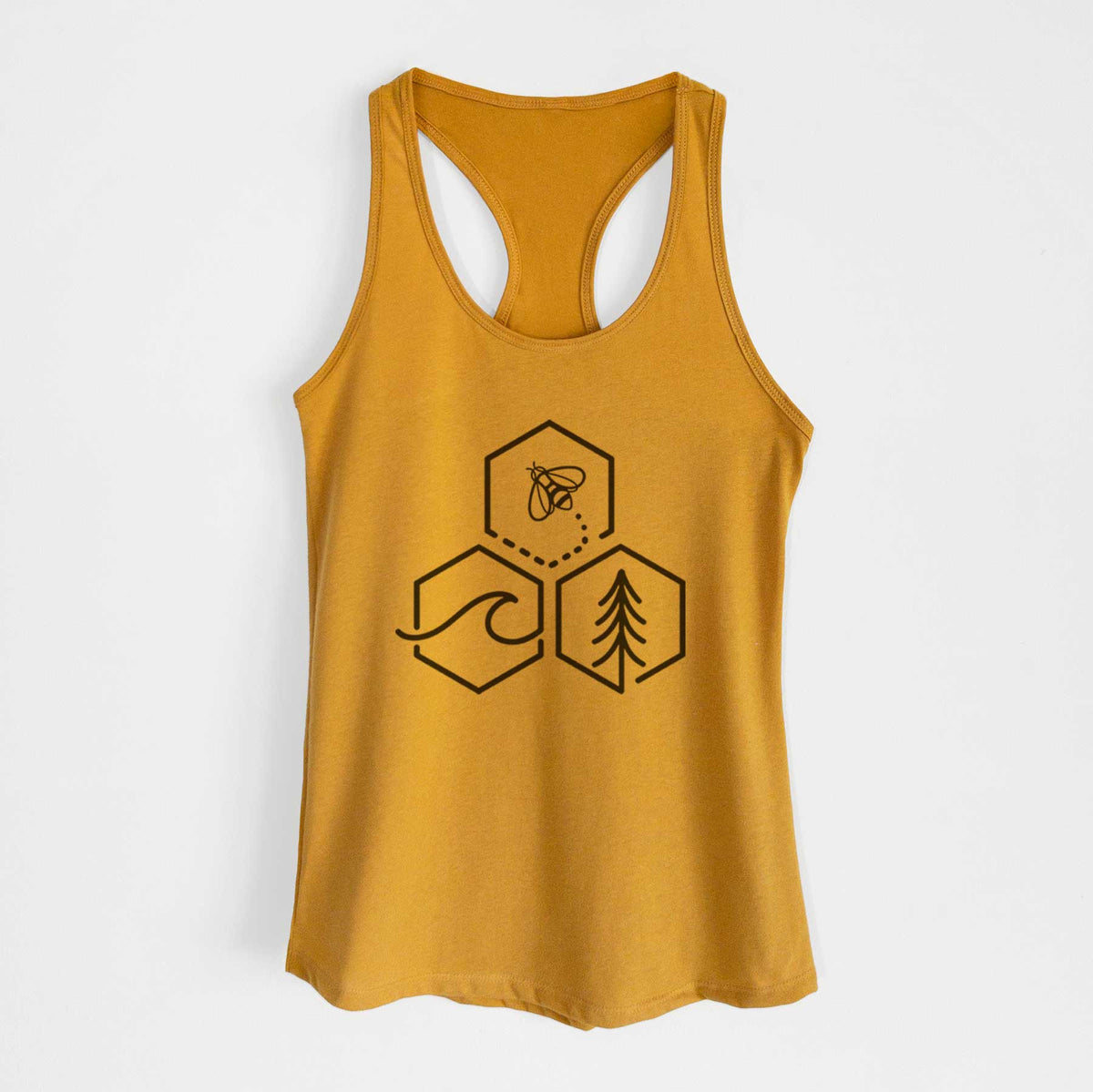 Gold women's racerback tank top laid flat, printed with a black line art design of three hexagons holding a bee, an ocean wave and a pine tree.