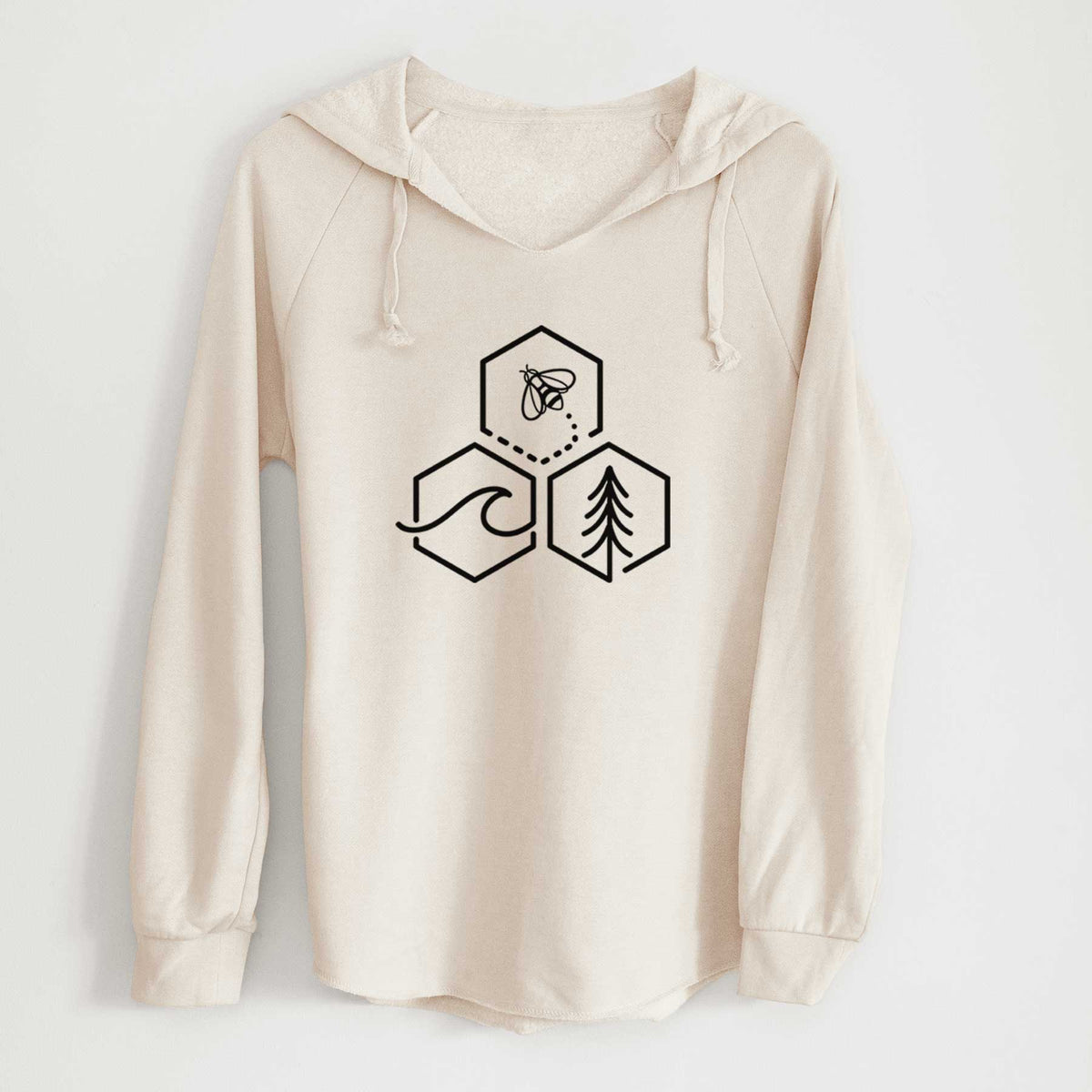 Bone cream women's Cali Wave hooded sweatshirt laid flat, printed with a black line art design of three hexagons holding a bee, an ocean wave and a pine tree.