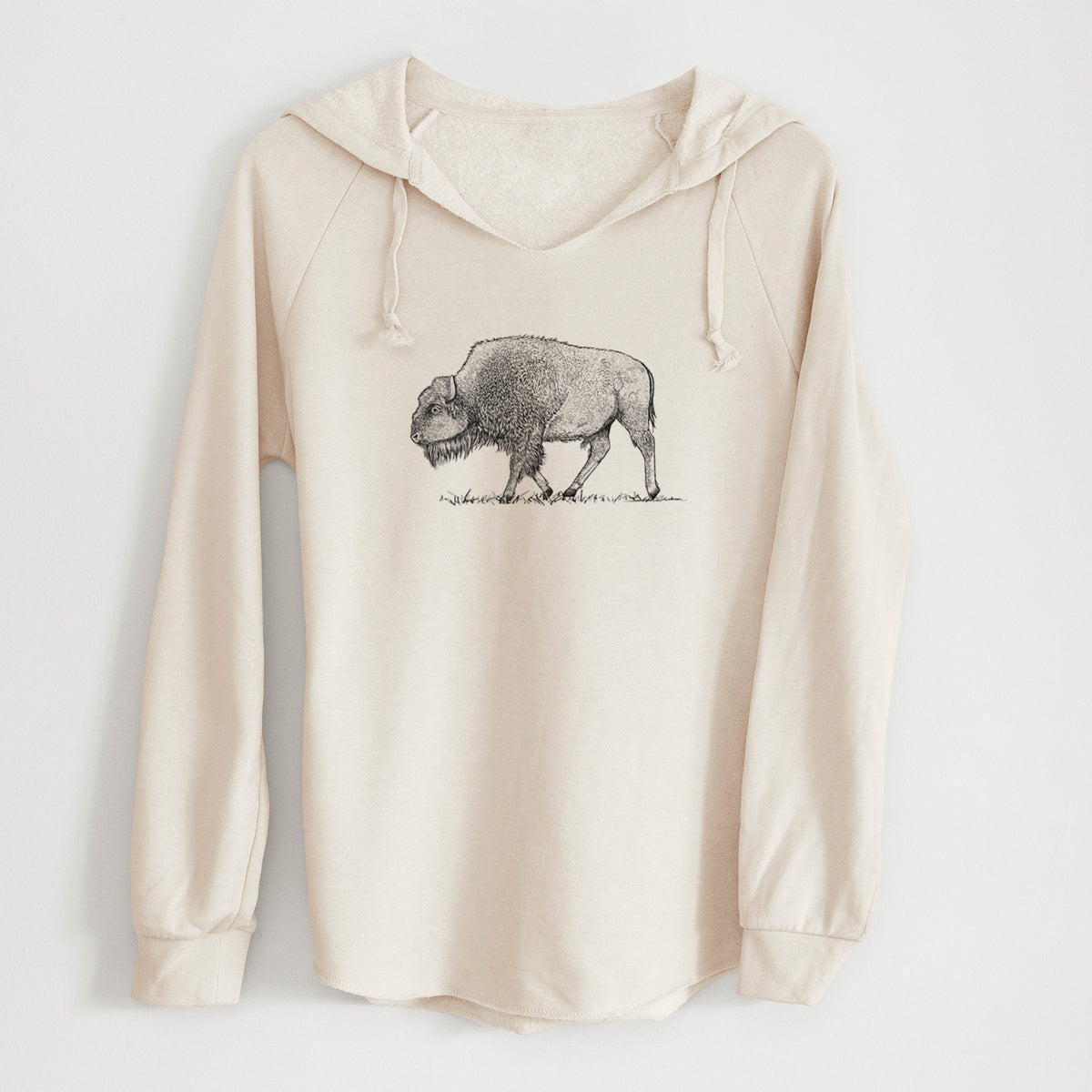 Bone cream women's Cali Wave hooded sweatshirt laid flat, printed with a detailed black ink illustration of an American bison walking through grass.