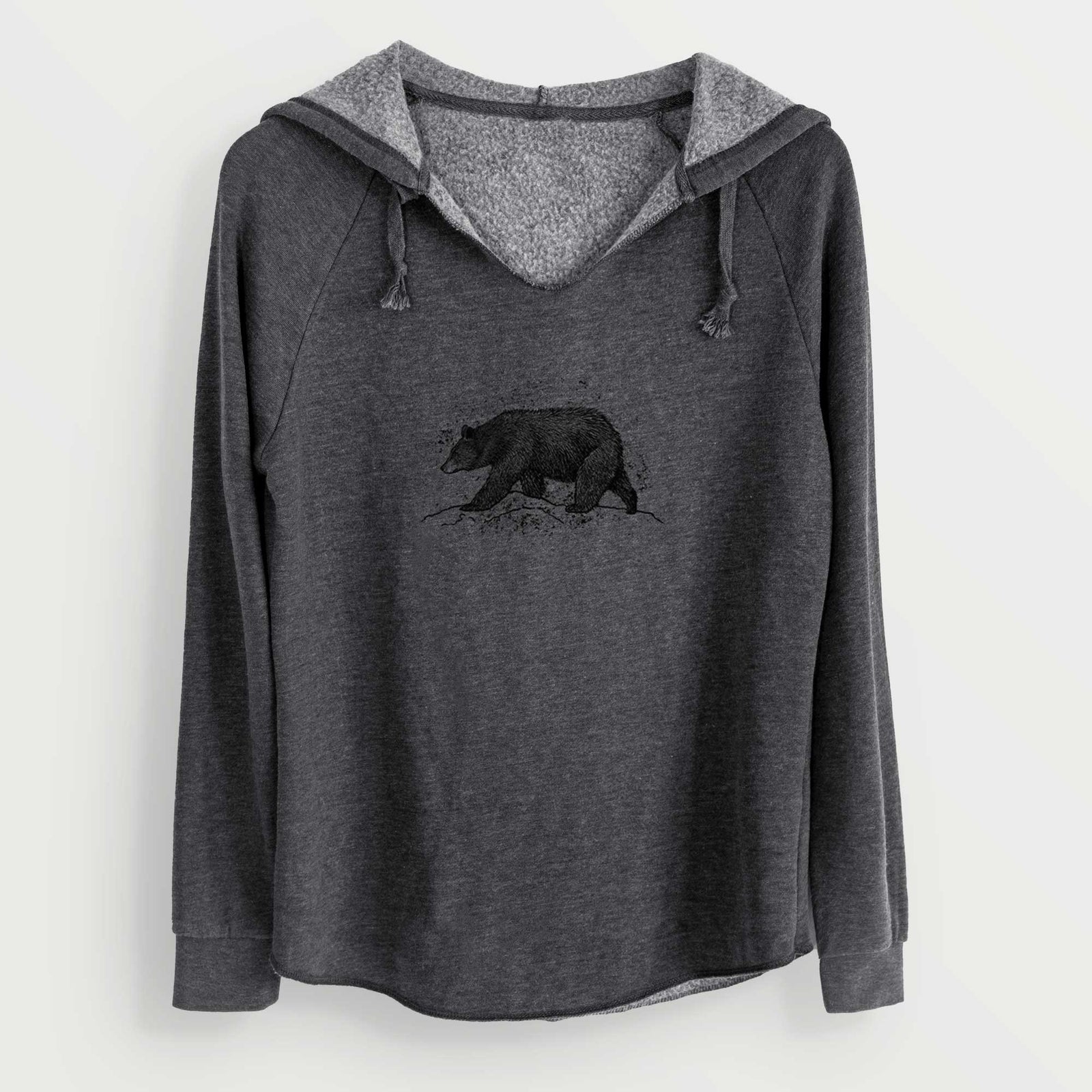 Charcoal grey women's Cali Wave hooded sweatshirt laid flat, printed with a detailed black ink sketch of a black bear walking across rocky ground.