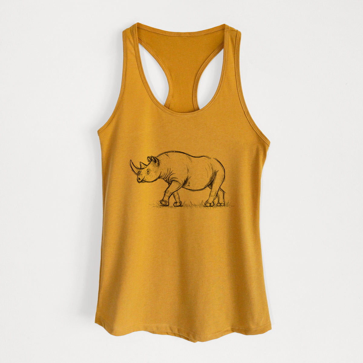 Gold women's racerback tank top laid flat, printed with a black ink illustration of a black rhinoceros walking.