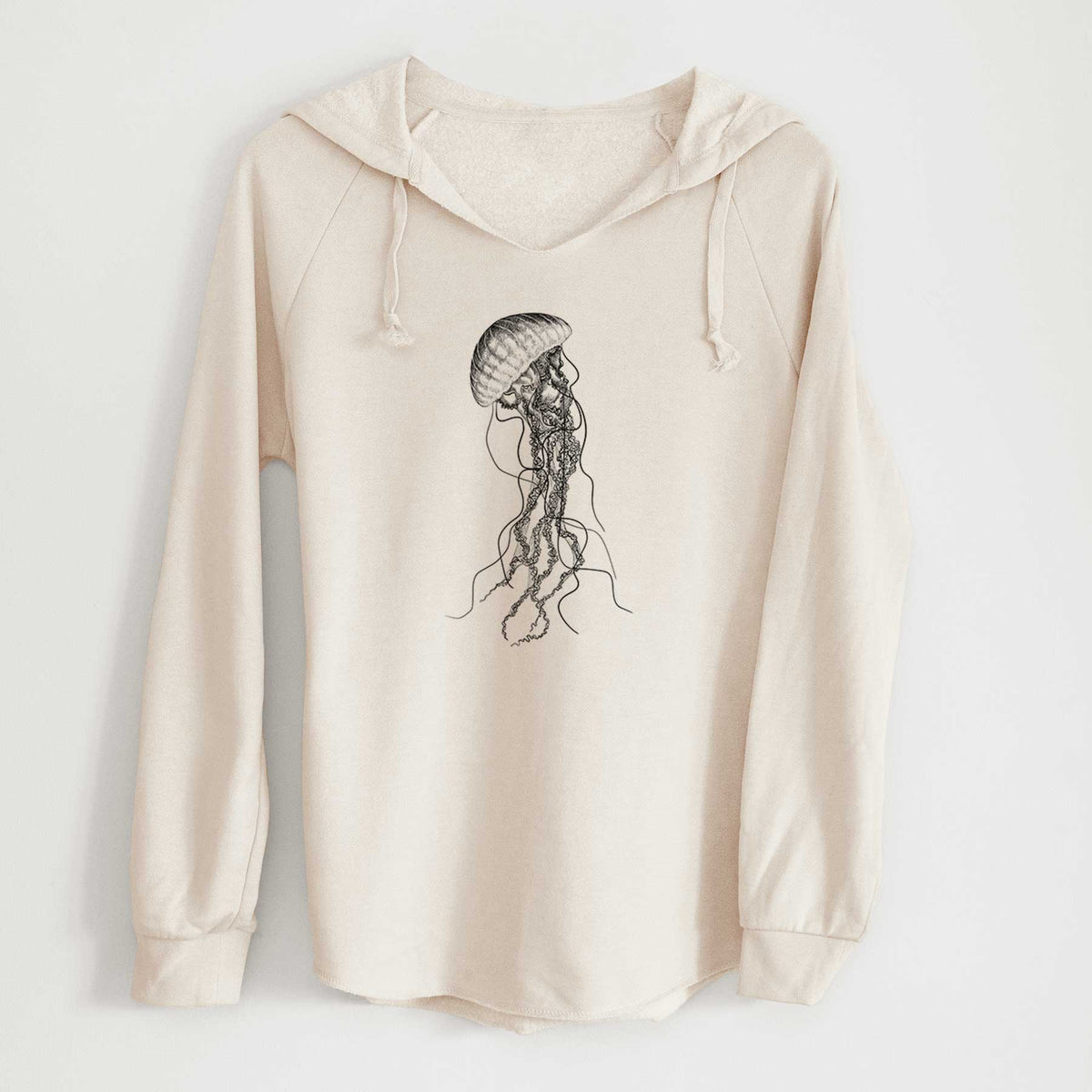 Bone cream women's Cali Wave hooded sweatshirt laid flat, printed with a black ink illustration of a black sea nettle jellyfish with long trailing tentacles.