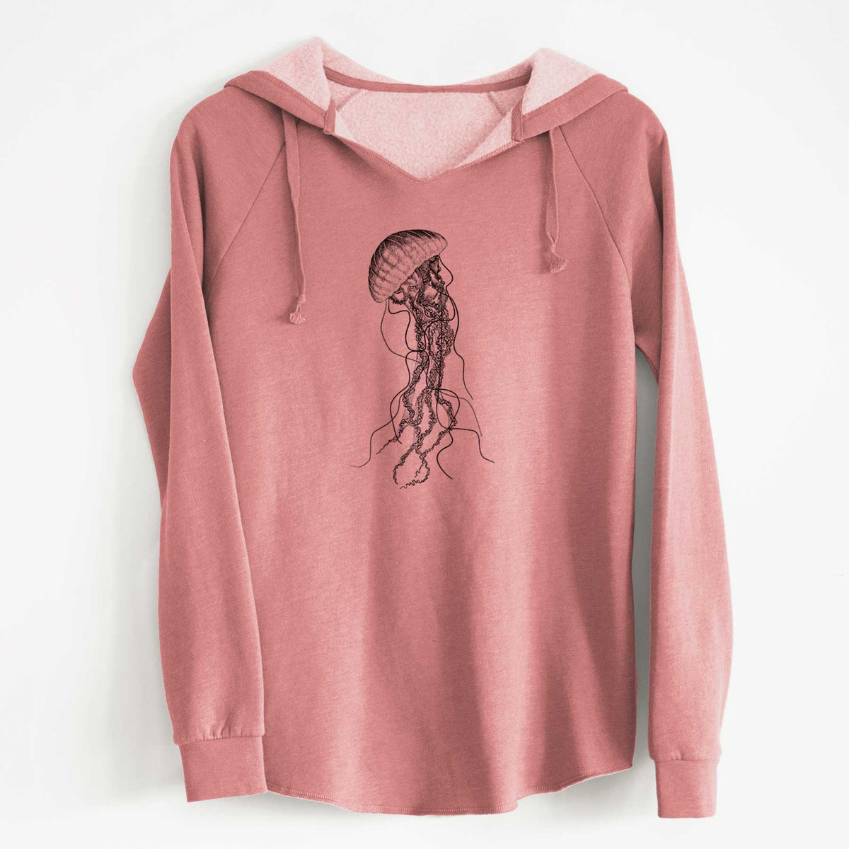 Dusty rose women's Cali Wave hooded sweatshirt laid flat, printed with a black ink illustration of a black sea nettle jellyfish with long trailing tentacles.