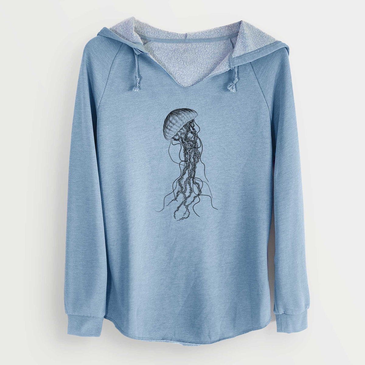 Misty blue women's Cali Wave hooded sweatshirt laid flat, printed with a black ink illustration of a black sea nettle jellyfish with long trailing tentacles.