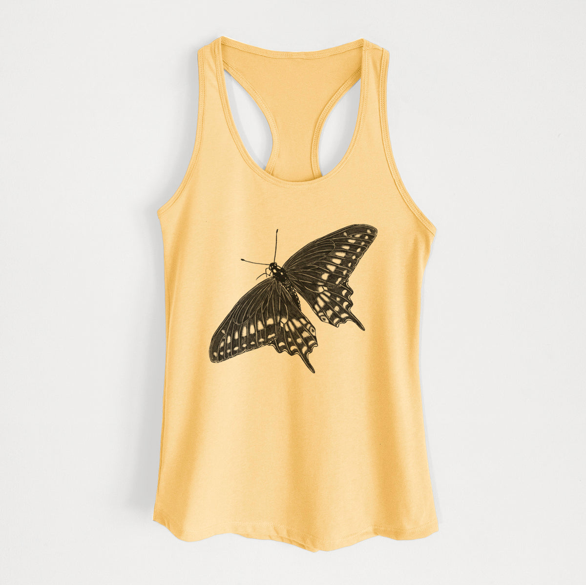 Banana cream women's racerback tank top laid flat, printed with a detailed black ink illustration of a black swallowtail butterfly with its wings spread.
