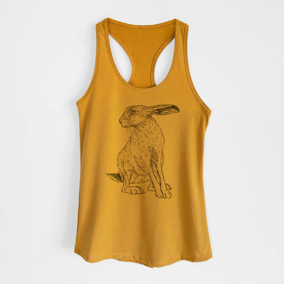Gold women's racerback tank top laid flat, printed with a detailed black ink illustration of a black-tailed jackrabbit sitting with long upright ears.