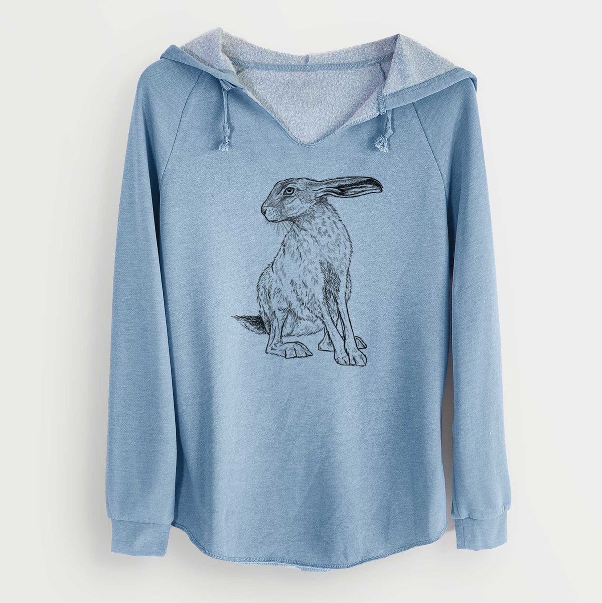 Misty blue women's Cali Wave hooded sweatshirt laid flat, printed with a detailed black ink illustration of a black-tailed jackrabbit sitting with long upright ears.