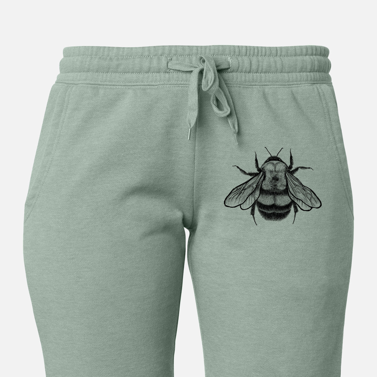 Front of sage green Cali Wave sweatpants, printed with a detailed black ink illustration of a rusty patched bumble bee with its wings spread, seen from above on the leg.