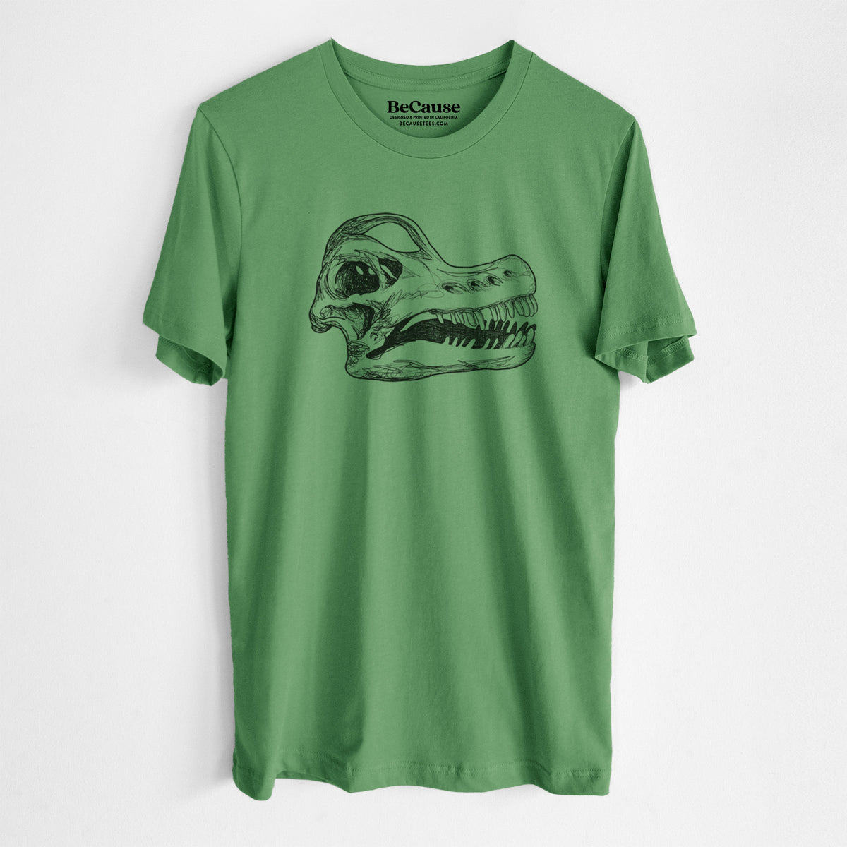 Leaf green lightweight cotton t-shirt laid flat, printed with a detailed black ink illustration of a Brachiosaurus skull.